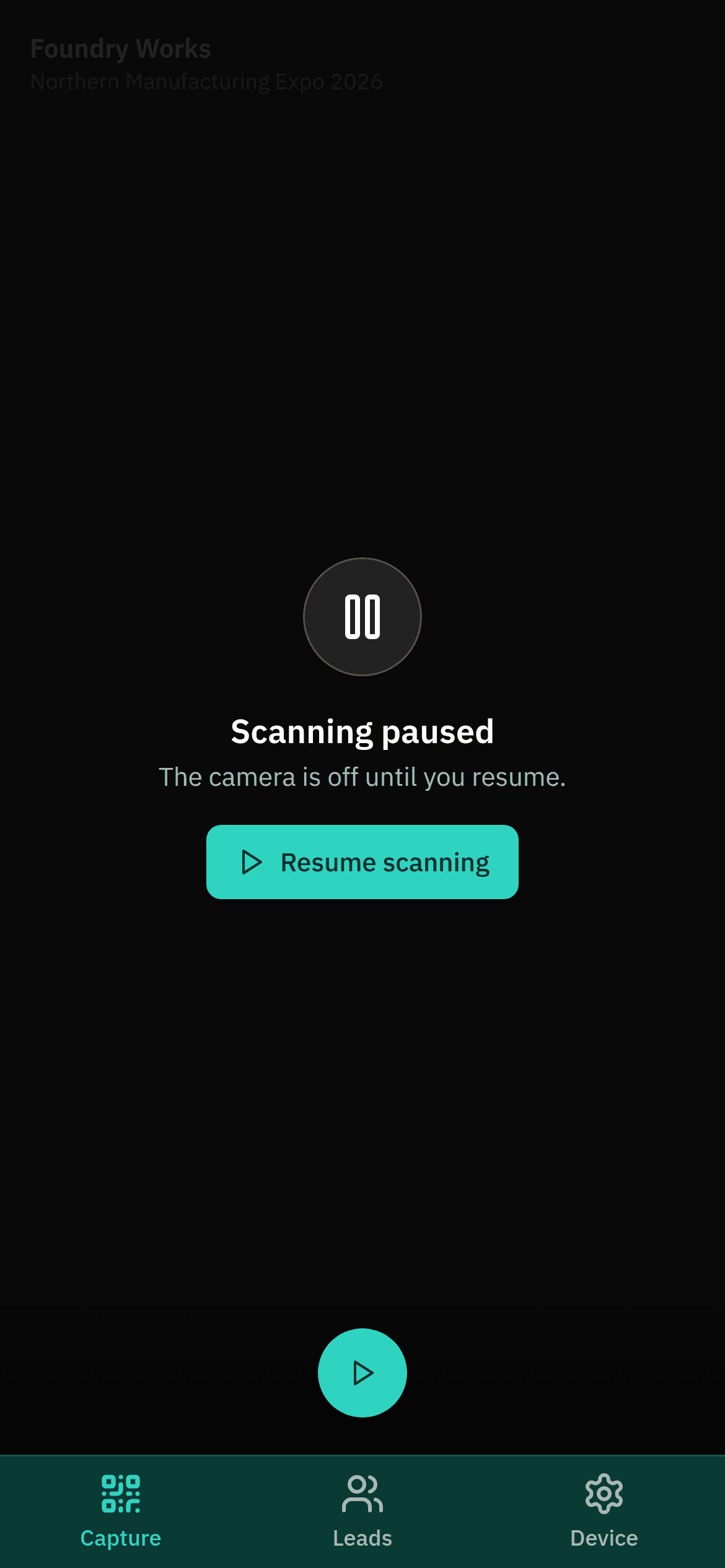The paused capture screen: a circled pause glyph, the heading Scanning paused, the line The camera is off until you resume, a Resume scanning button, and the app's navigation still visible below.